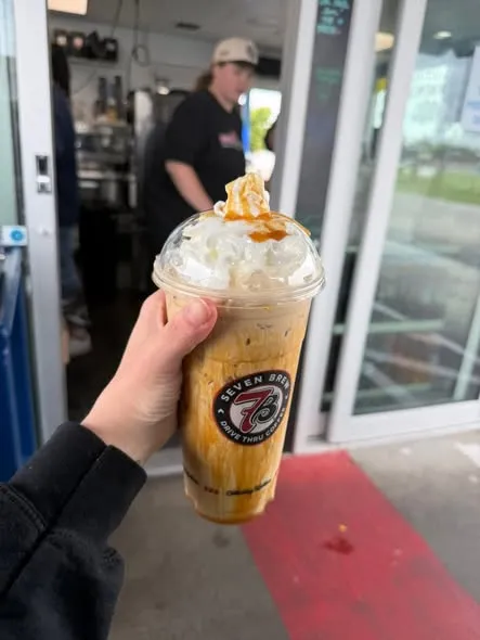 7 Brew syrup bottles or drink customization at the counter